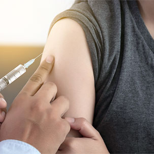 Vaccine being injected into arm