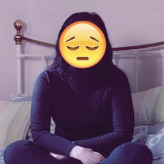 Girl with sad emoticon face